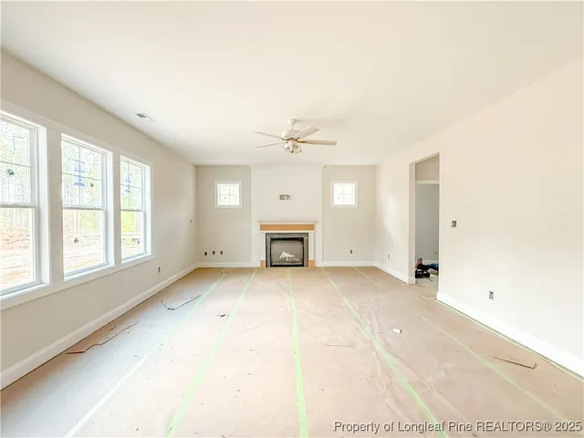a kitchen with kitchen island cabinets a sink and a stove