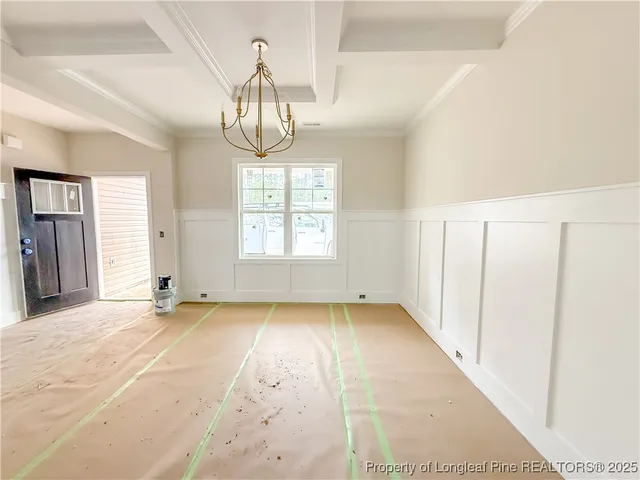 a large kitchen with a large window