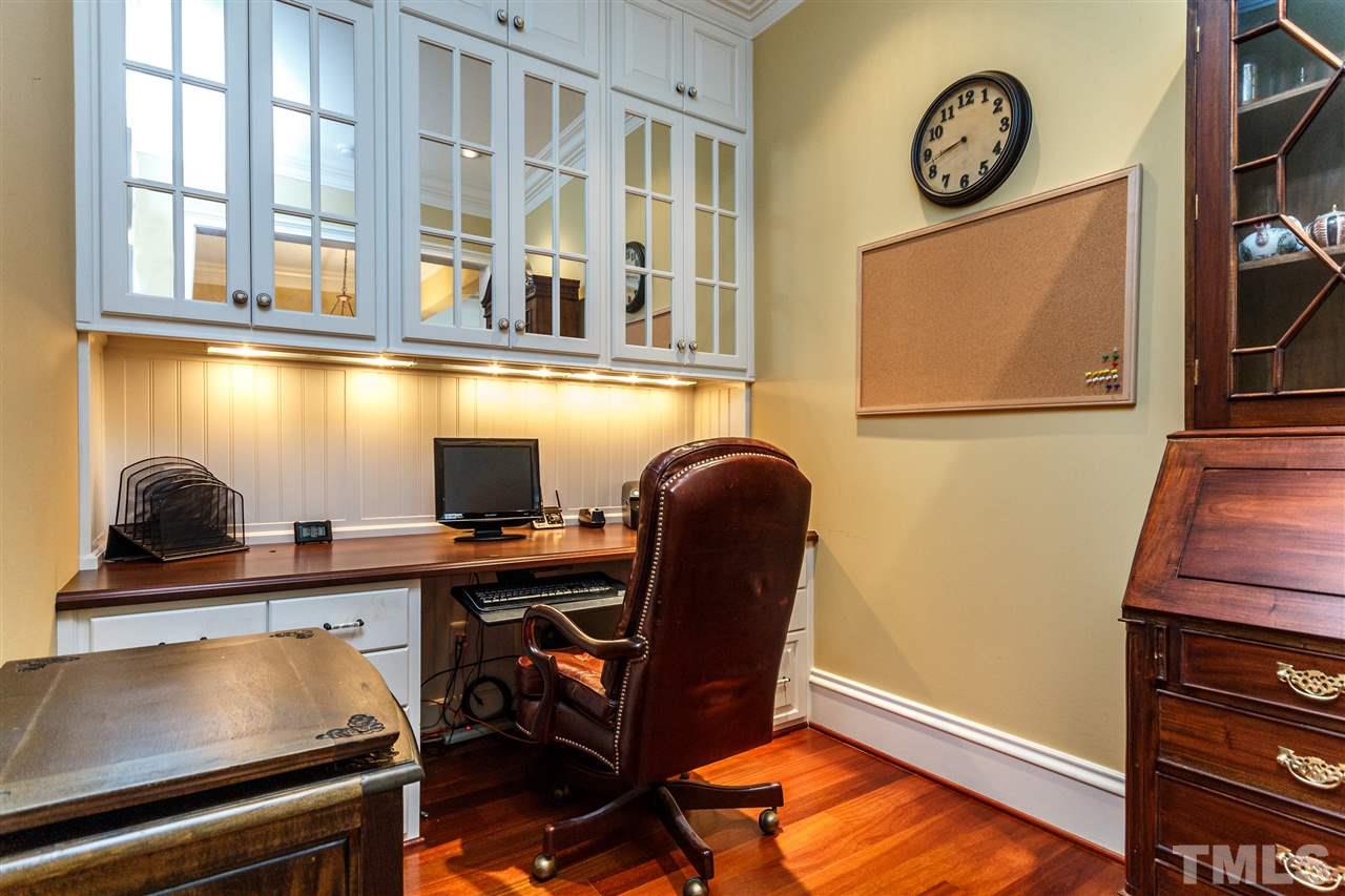 3721 Rolston Drive Raleigh, NC 27609 - Photo 13 of 30 a view of a workspace with furniture and a window