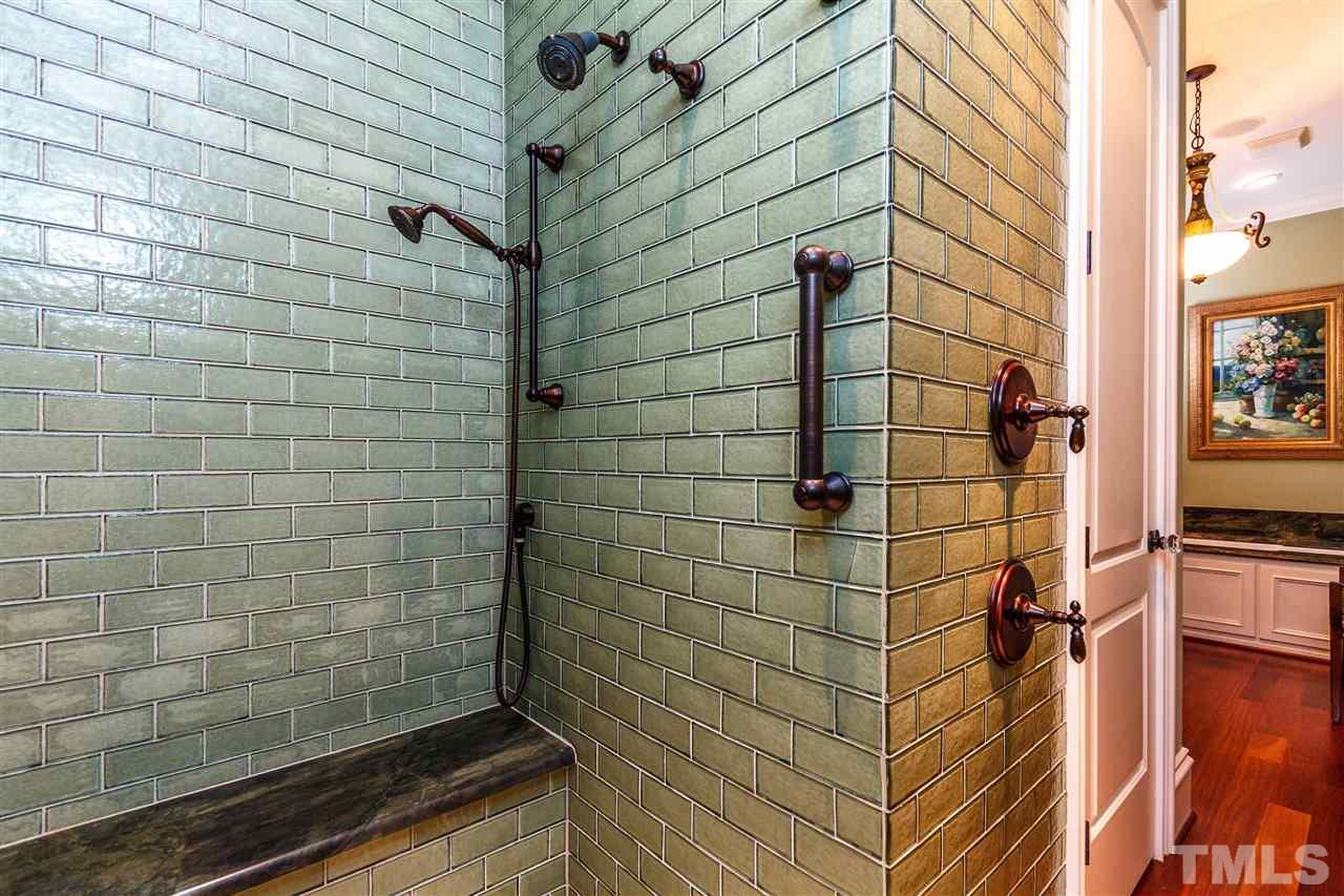 3721 Rolston Drive Raleigh, NC 27609 - Photo 17 of 30 a bathroom with a shower