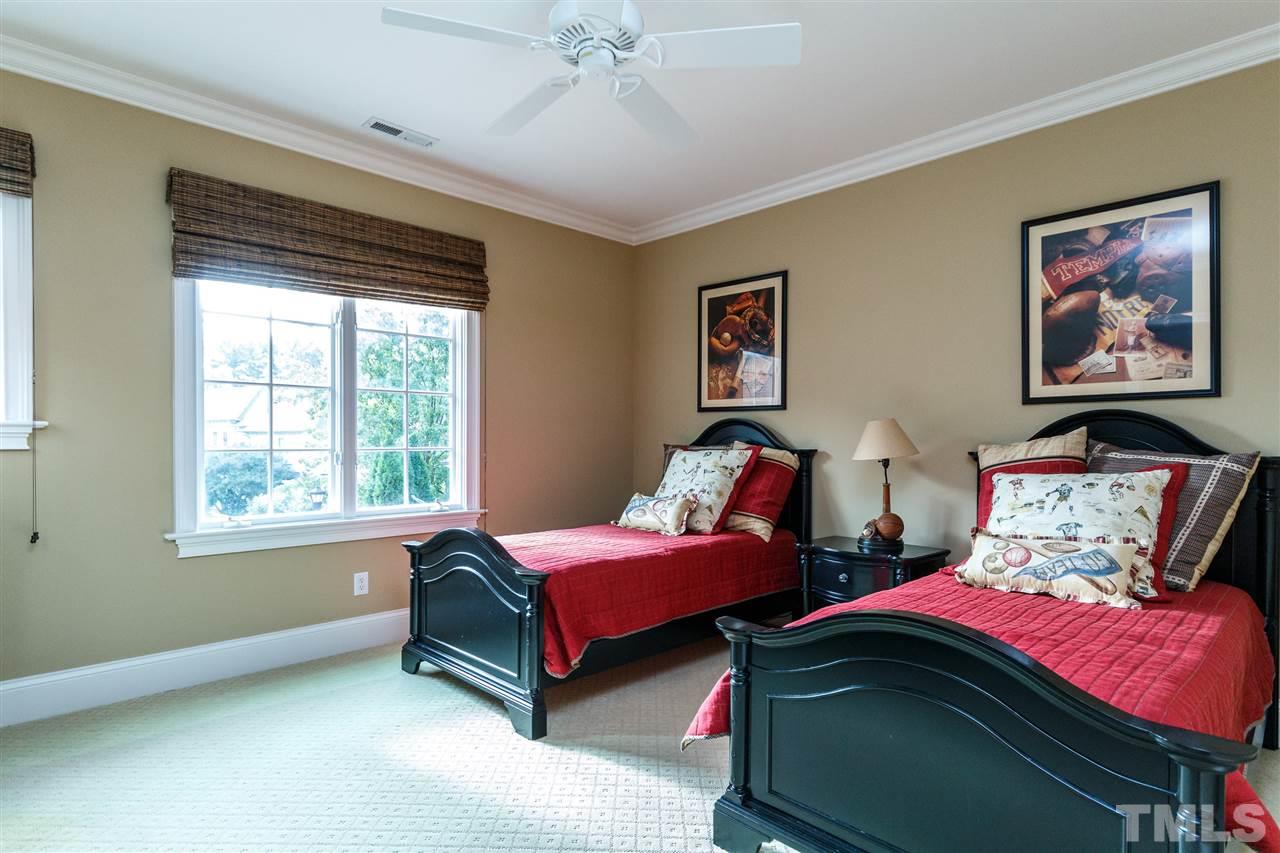 3721 Rolston Drive Raleigh, NC 27609 - Photo 19 of 30 a bedroom with two beds and a window