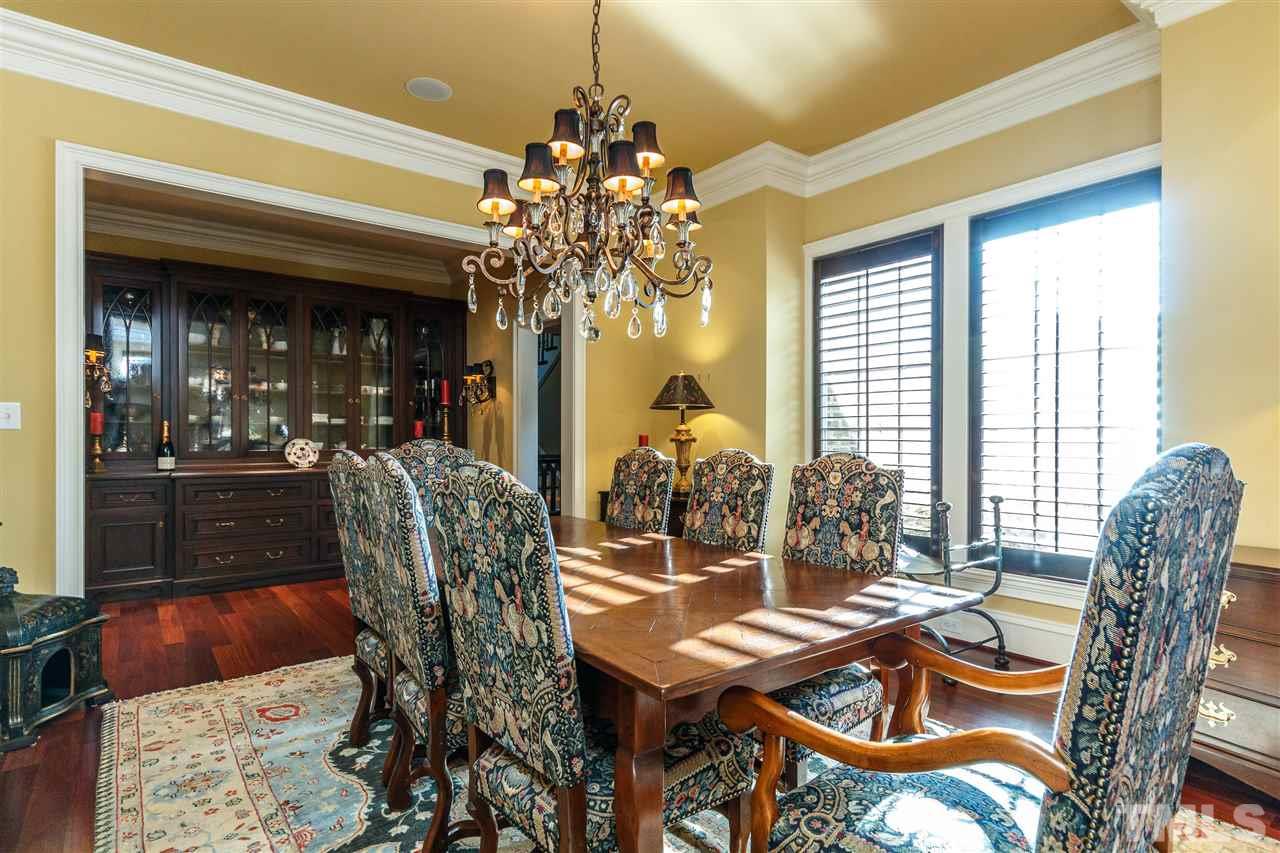 3721 Rolston Drive Raleigh, NC 27609 - Photo 3 of 30 a view of a dining room with furniture window and outside view