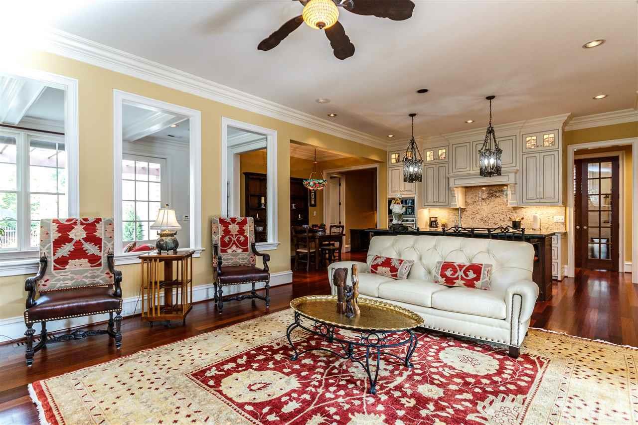 3721 Rolston Drive Raleigh, NC 27609 - Photo 7 of 30 a living room with furniture and a rug