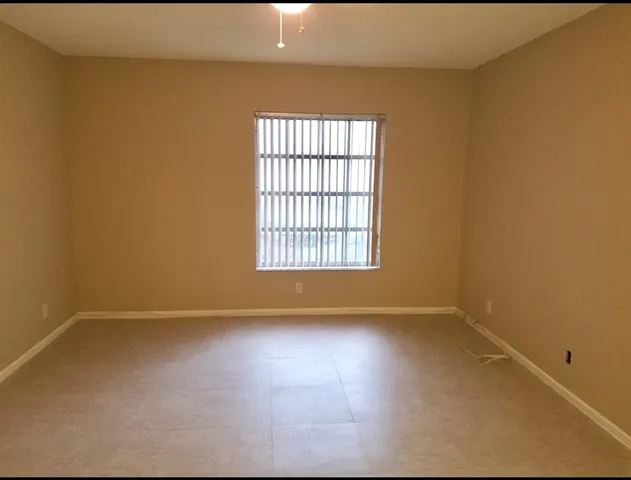 an empty room with a window