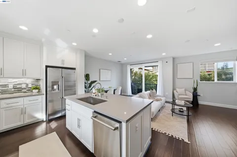 a bedroom with bed and night stand