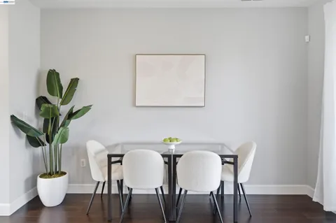 a bedroom with a large bed and furniture