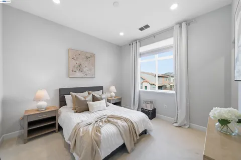 a bathroom with a sink double vanity and a mirror