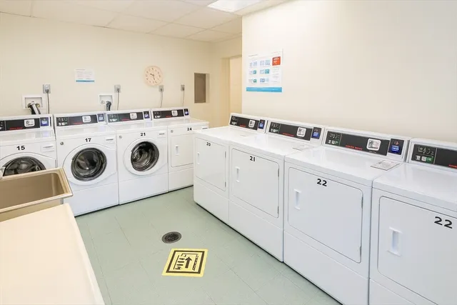 an outdoor space with furniture and garden