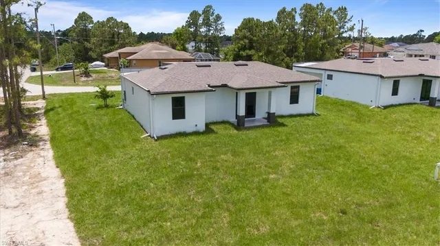 a aerial view of a house with garden