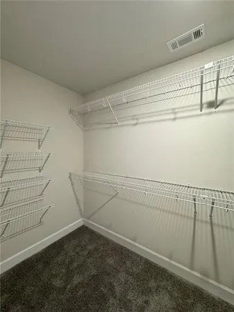 a view of a room with racks on the wall