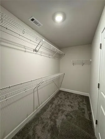 a view of a room with racks on the wall
