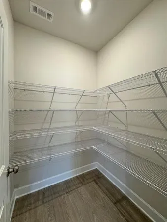 a view of a room with an empty space