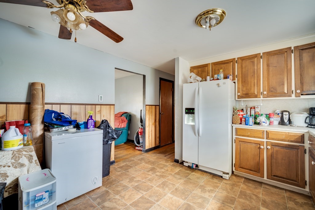 109 Middle Street Springfield, MA 01104 - Photo 7 of 14 a kitchen with a refrigerator and a sink