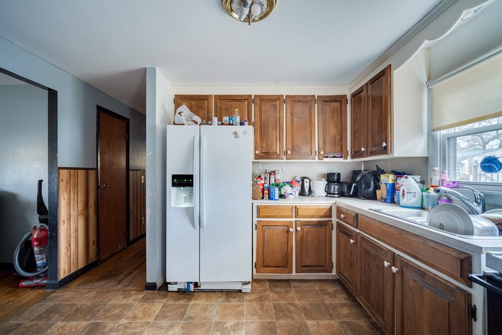 109 Middle Street Springfield, MA 01104 - Photo 8 of 14 a kitchen with a refrigerator and a sink