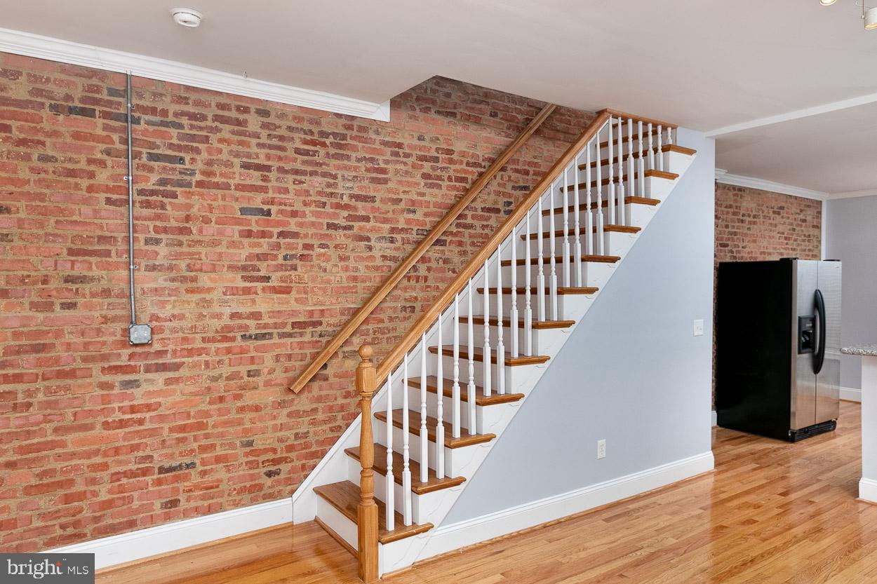 126 Rochester Place Baltimore, MD 21224 - Photo 3 of 33 Historic Exposed Brick Walls!
