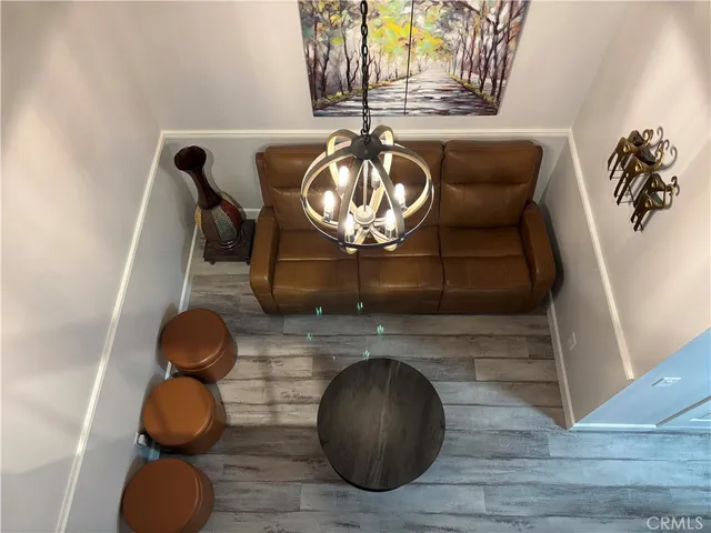 a view of a backyard with sitting area and furniture