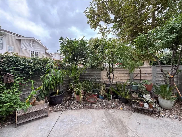 an outdoor space with patio and swimming pool