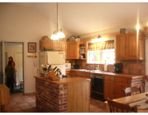 414 Mountain Road Holyoke, MA 01040 - Photo 5 of 9 a kitchen with a sink and cabinets
