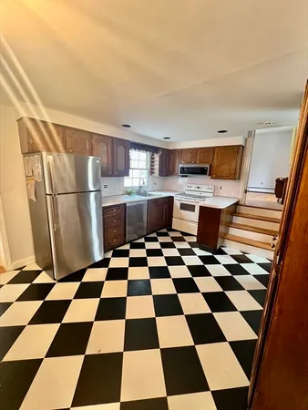 a black and white checkered floor with a black white checkered floor
