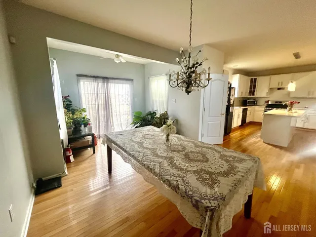 a view of a living room and kitchen