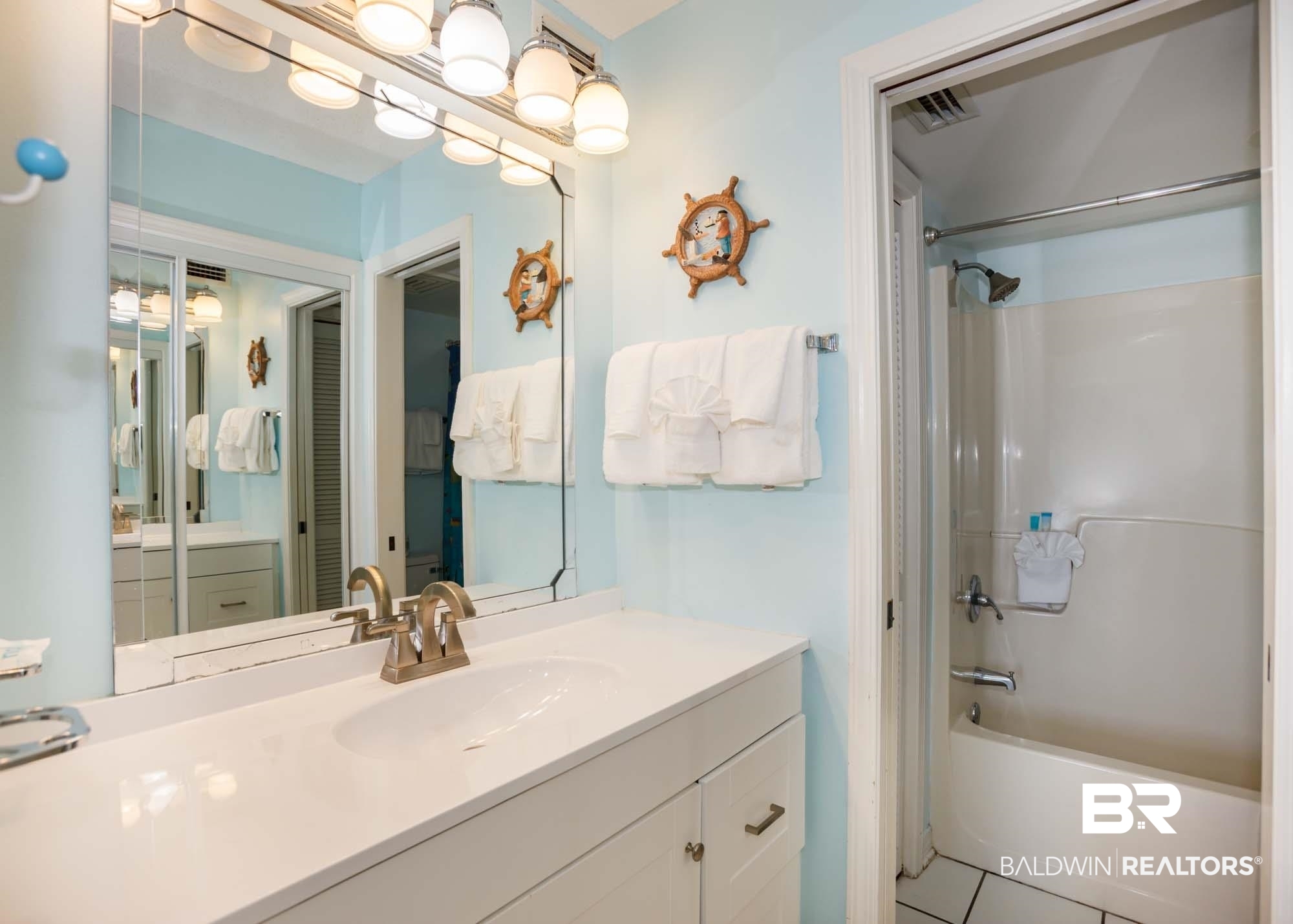 645 Plantation Road, Unit 6311 Gulf Shores, AL 36542 - Photo 15 of 43 Bathroom with washtub / shower combination, vanity, and tile patterned flooring