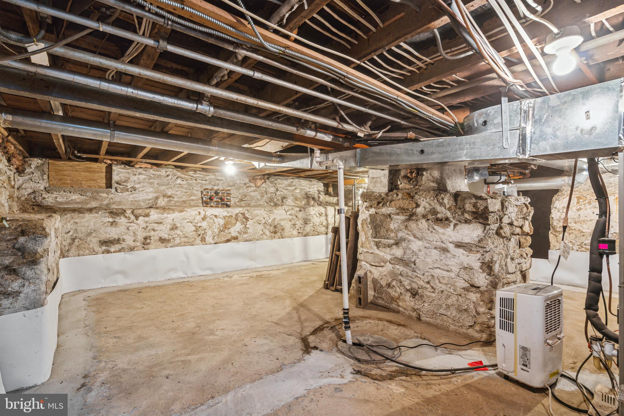 5305 Tuscarawas Road Bethesda, MD 20816 - Photo 56 of 72 Wine cellar--sump pump, French drain, waterproofed
