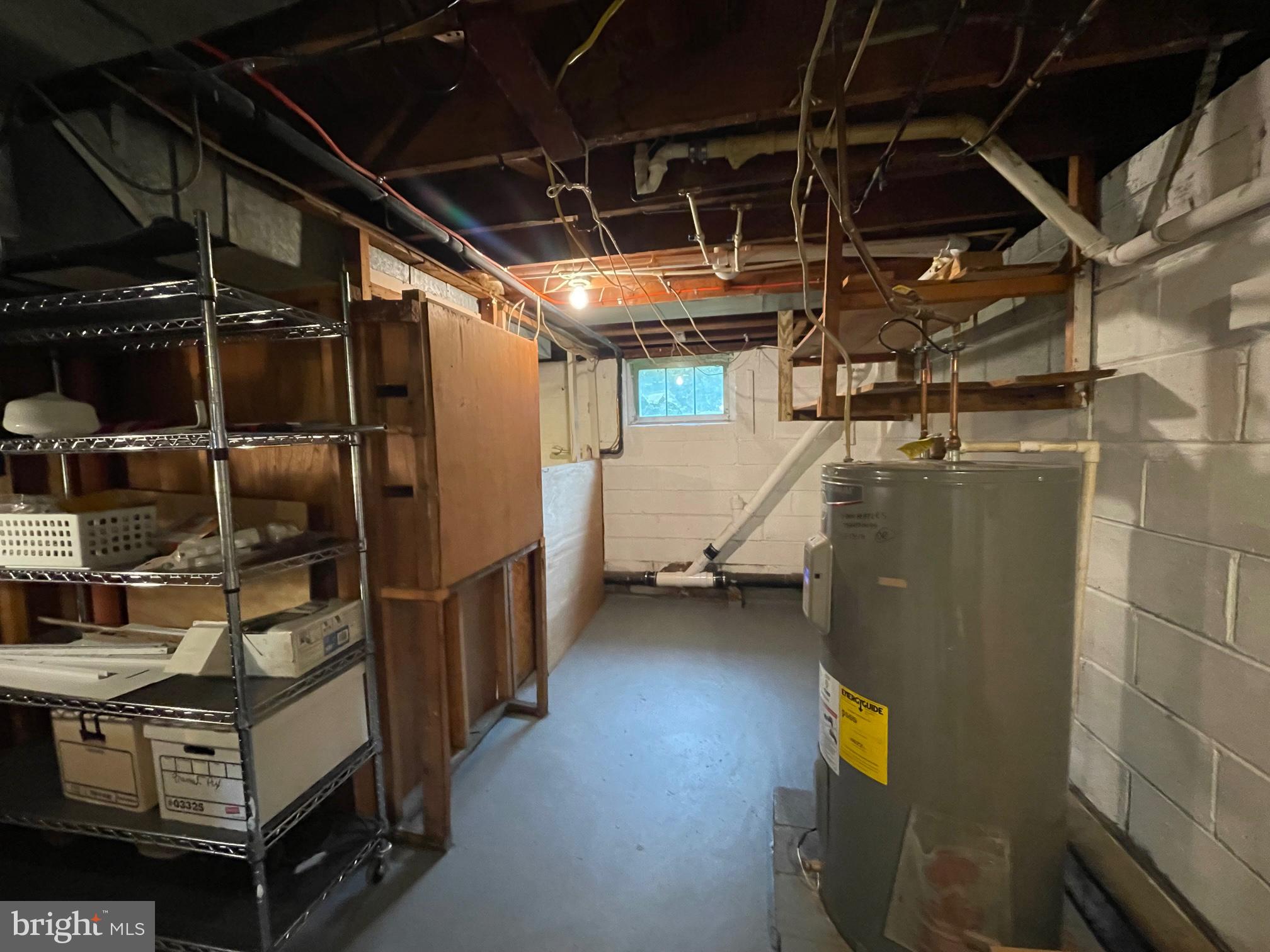 21 Fahnestock Road Malvern, PA 19355 - Photo 26 of 29 Storage area past Laundry w/ more shelves