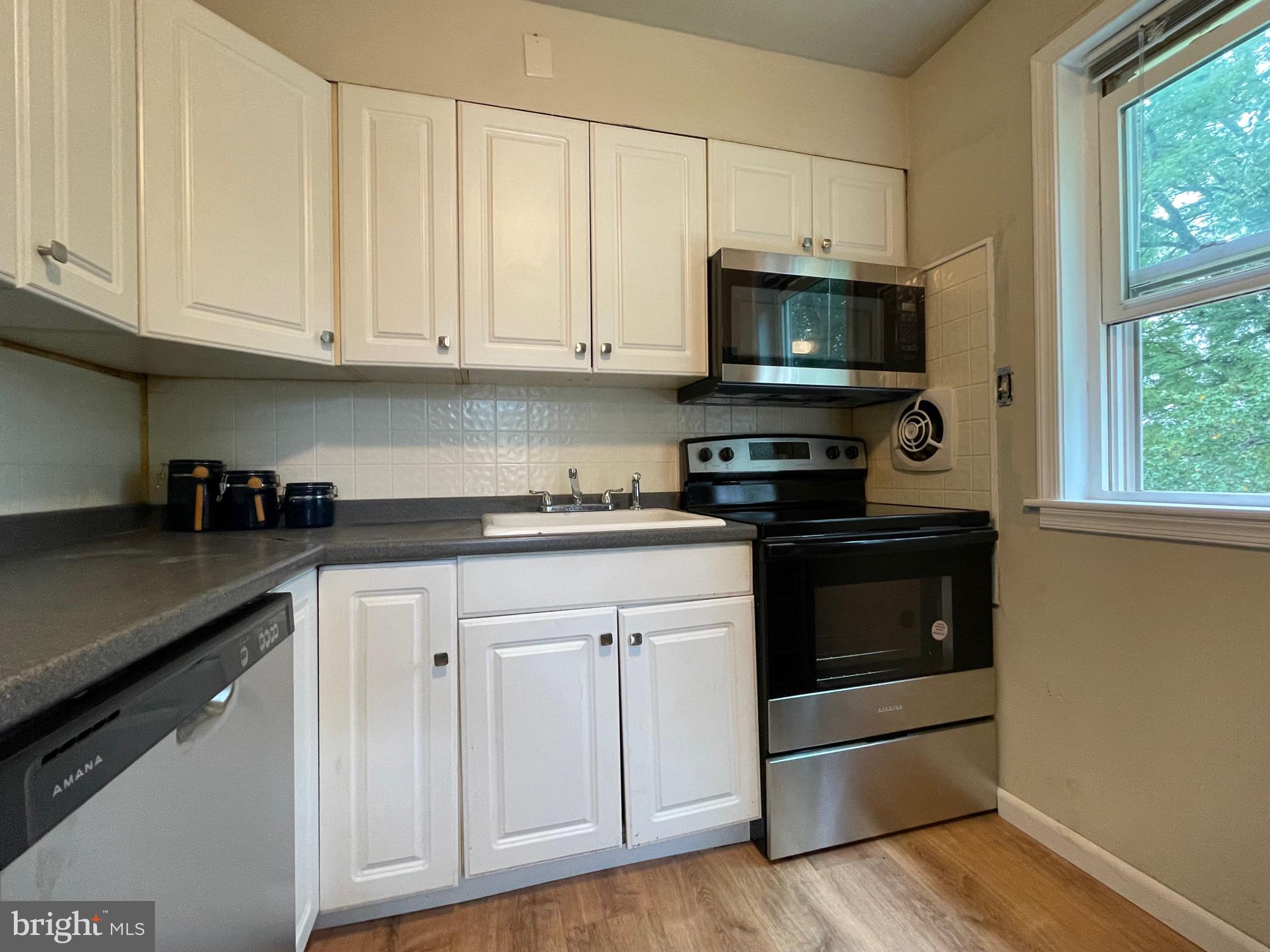 21 Fahnestock Road Malvern, PA 19355 - Photo 6 of 29 White KIT w/ NEW: stove, dishwasher, microwave