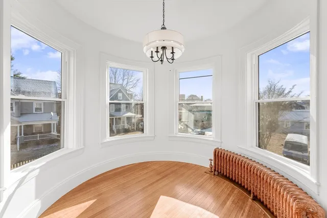 a bathroom with a sink toilet a mirror and vanity