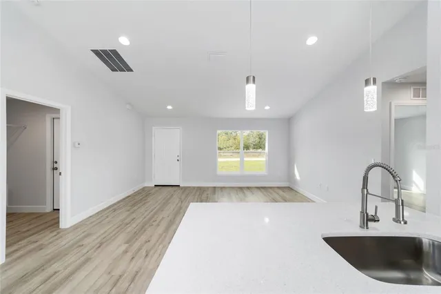 a view of an empty room and window