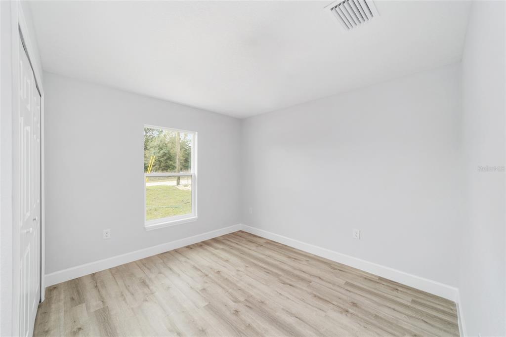 14395 Southwest 18th Place Ocala, FL 34481 - Photo 28 of 38 an empty room with a window