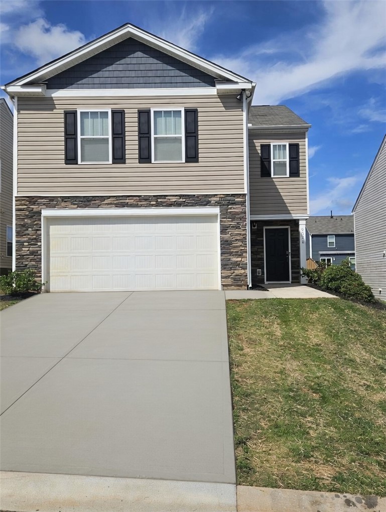902 Ashwood Lane Easley, SC 29640 - Photo 1 of 39 A traditional façade, with stone accents and durable siding, welcomes you home.