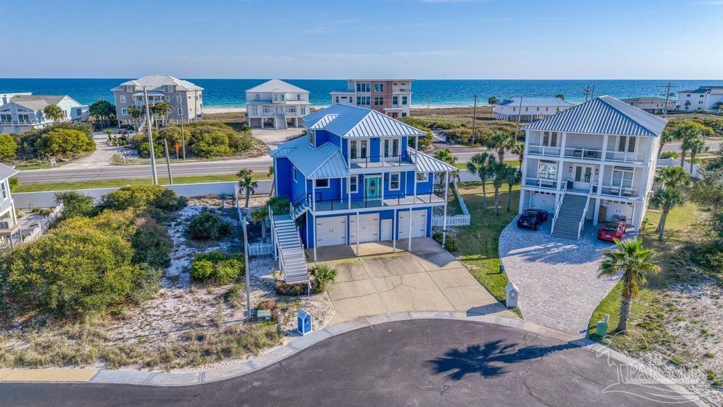 321 Gulfview Lane Perdido Key, FL 32507 - Photo 9 of 57 front view of a house with a porch