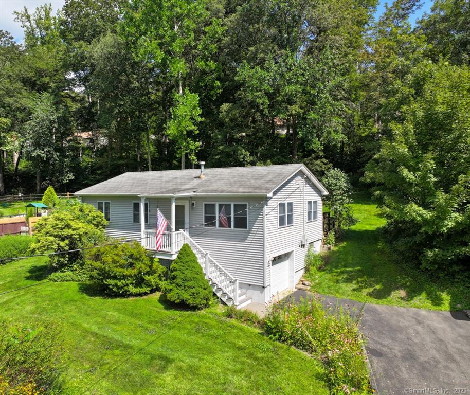 871 Lakeside Road Southbury, CT 06488 - Photo 1 of 1 a front view of a house with a yard