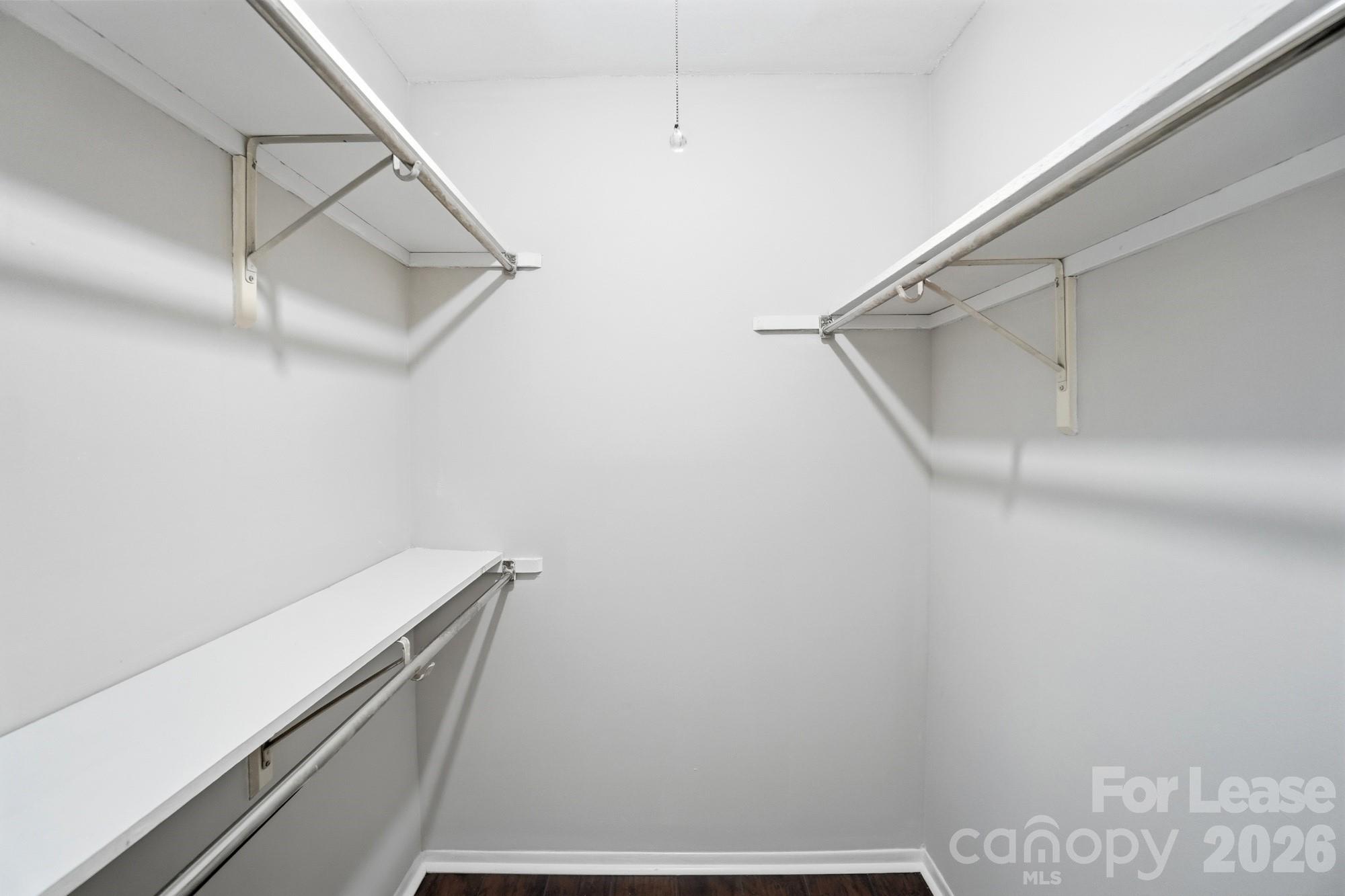 4948 Sardis Road, Unit C Charlotte, NC 28270 - Photo 14 of 25 a view of a room with racks on the wall