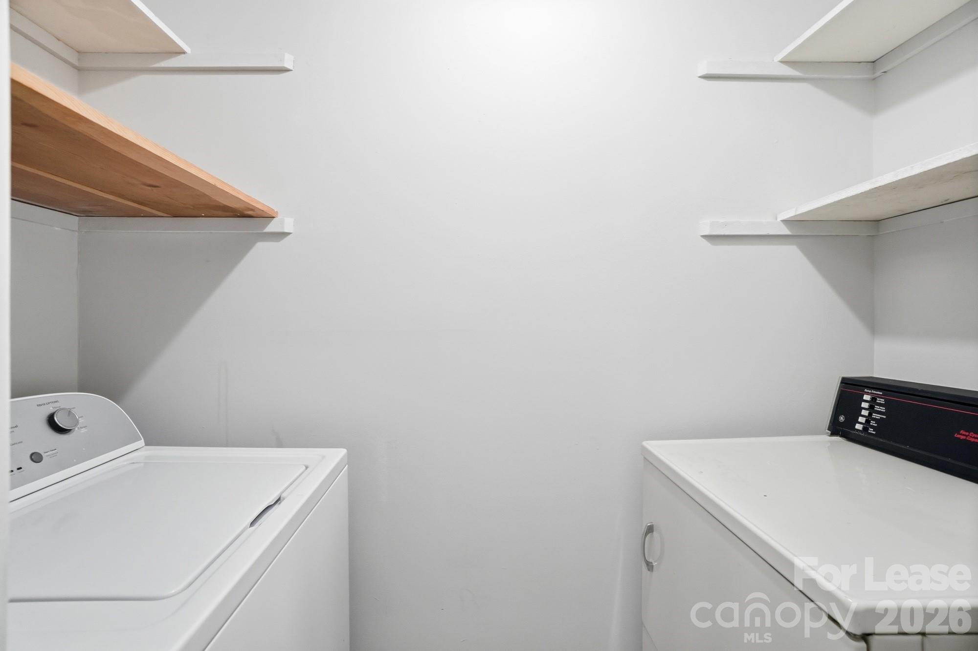 4948 Sardis Road, Unit C Charlotte, NC 28270 - Photo 23 of 25 a utility room with dryer and washer