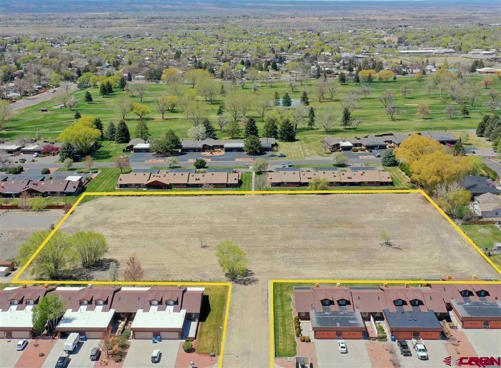 an aerial view of a house with a outdoor space