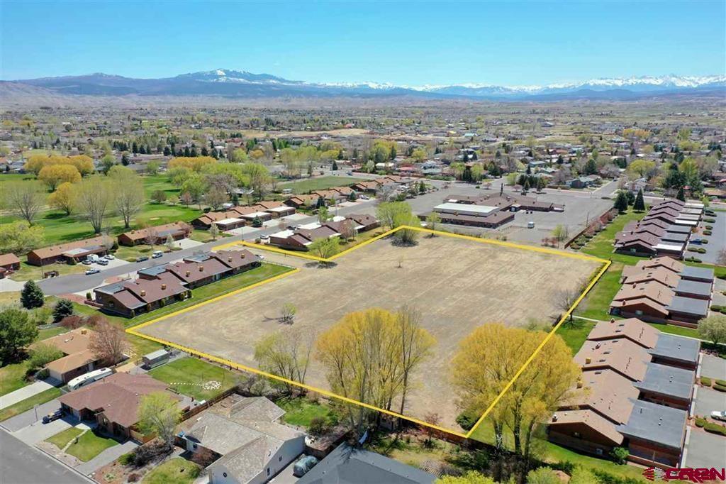 Tbd Margo Court Montrose, CO 81401 - Photo 2 of 12 an aerial view of residential houses with outdoor space