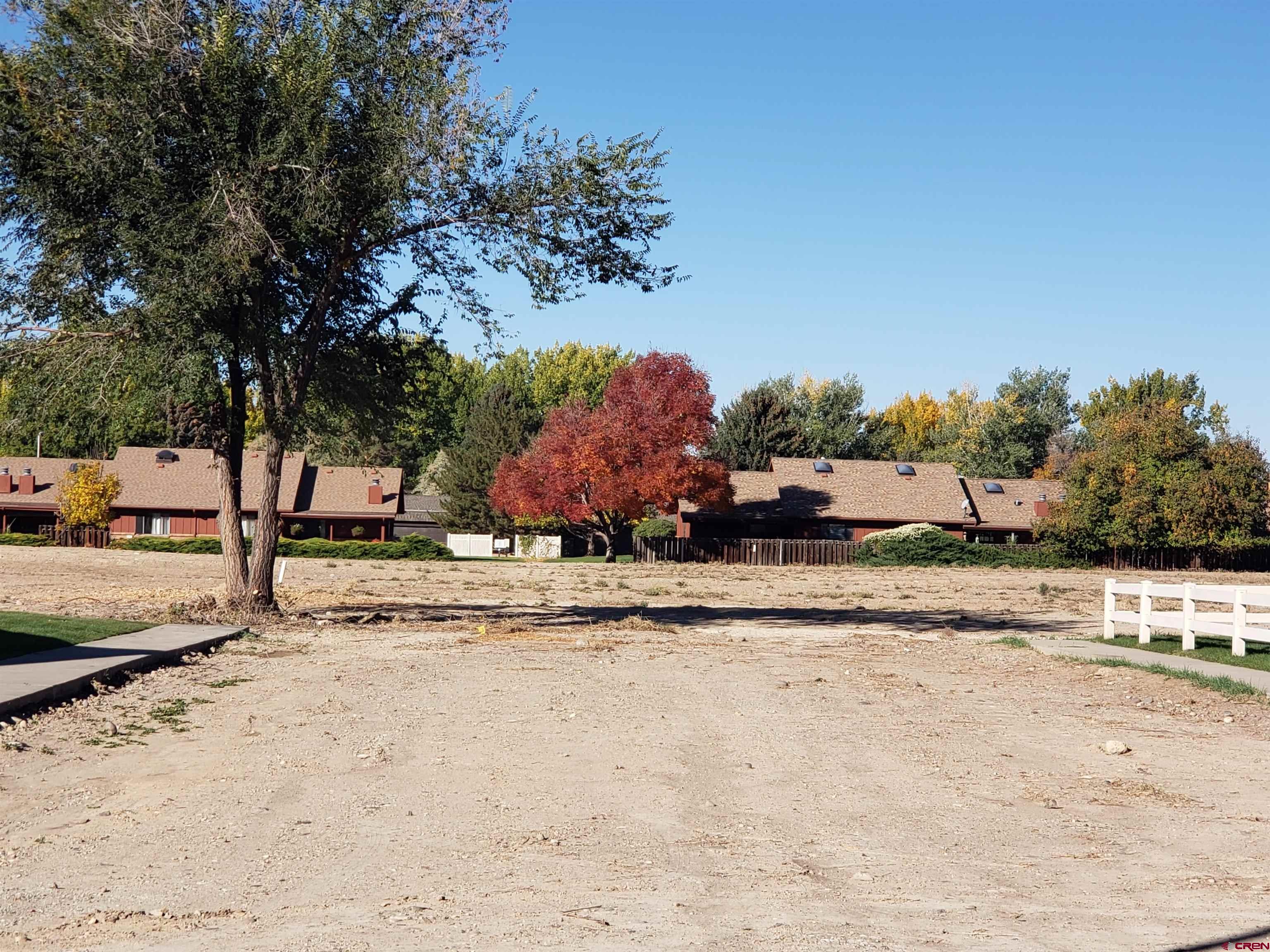 Tbd Margo Court Montrose, CO 81401 - Photo 3 of 12 a view of a yard with a tree