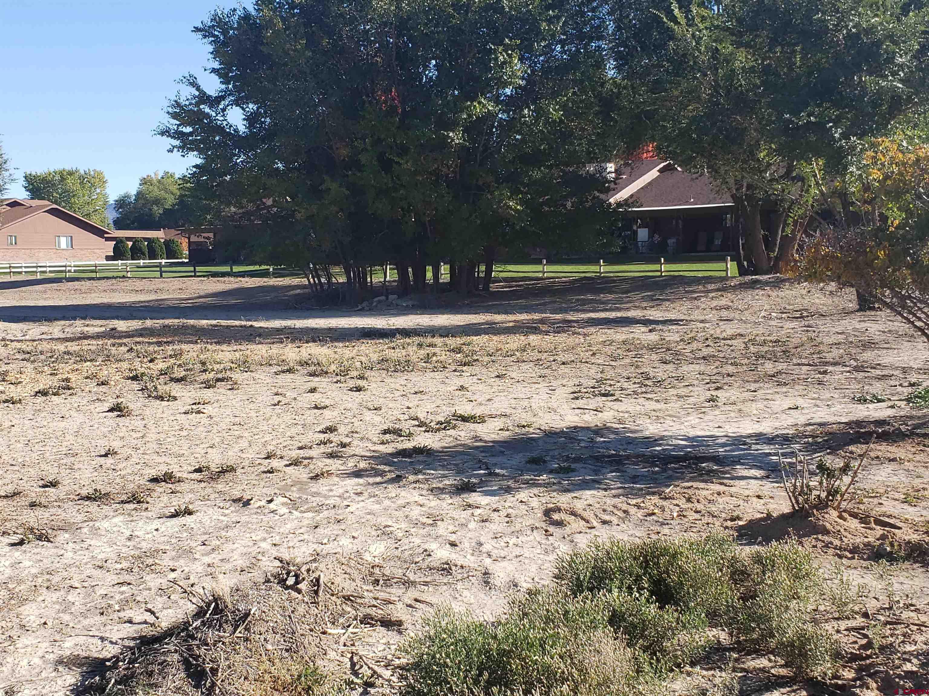 Tbd Margo Court Montrose, CO 81401 - Photo 7 of 12 a front view of a house with a yard
