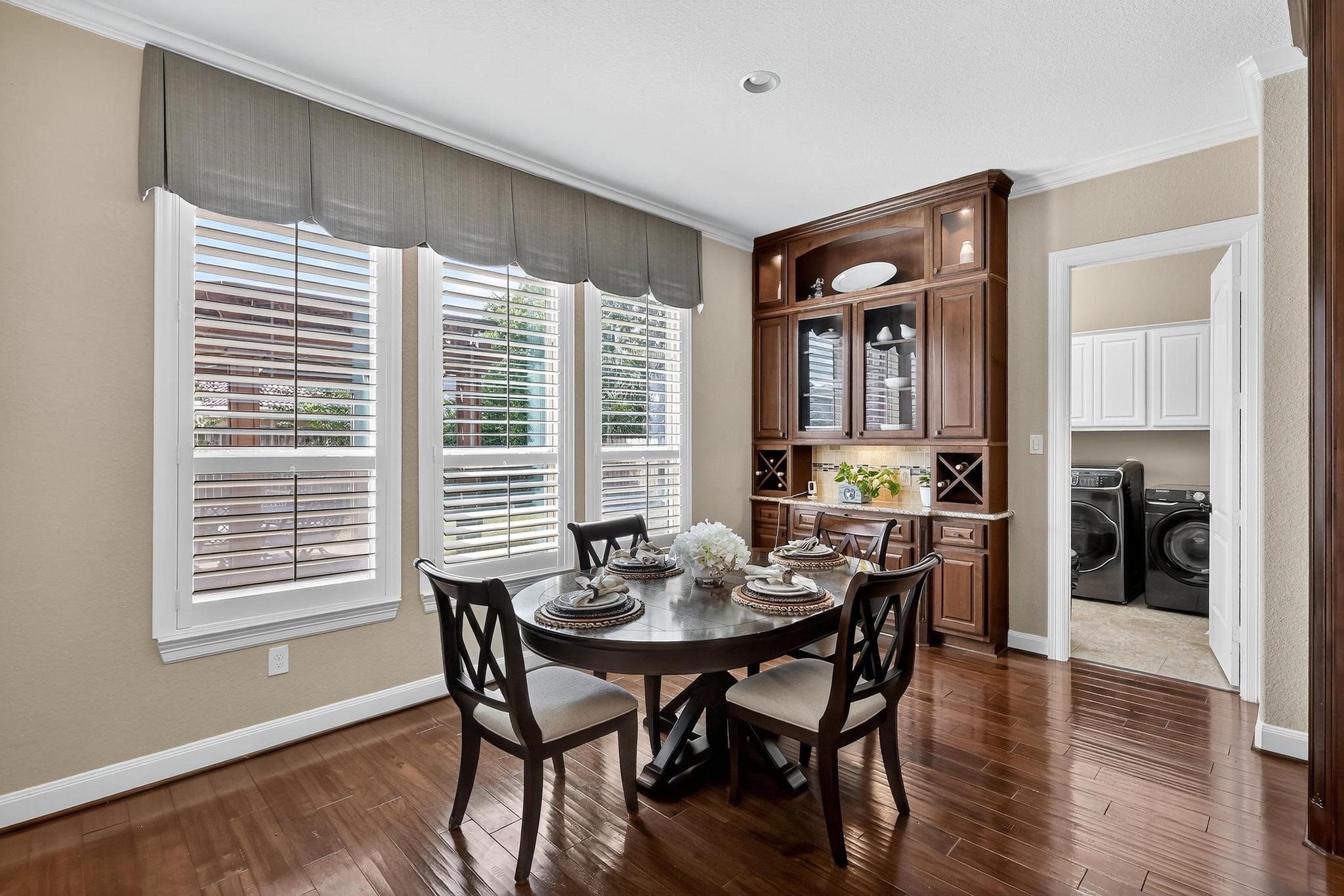 25803 Heritage Maple Drive Spring, TX 77389 - Photo 14 of 46 a view of a dining room with furniture and window