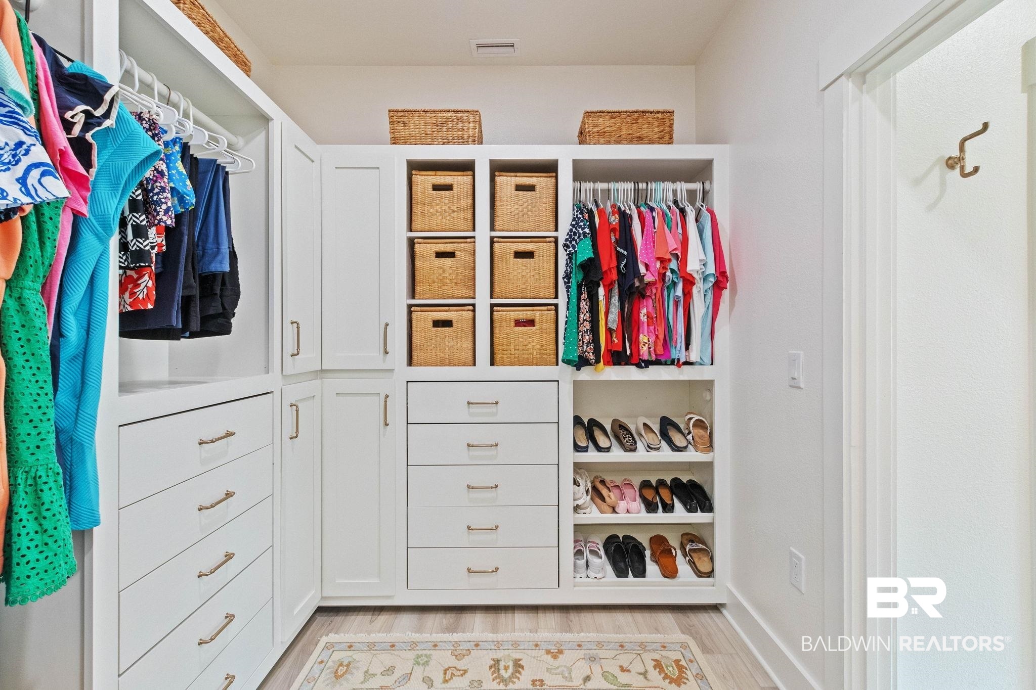 9815 Lakeview Drive Foley, AL 36535 - Photo 41 of 100 Walk in closet featuring light hardwood / wood-style flooring
