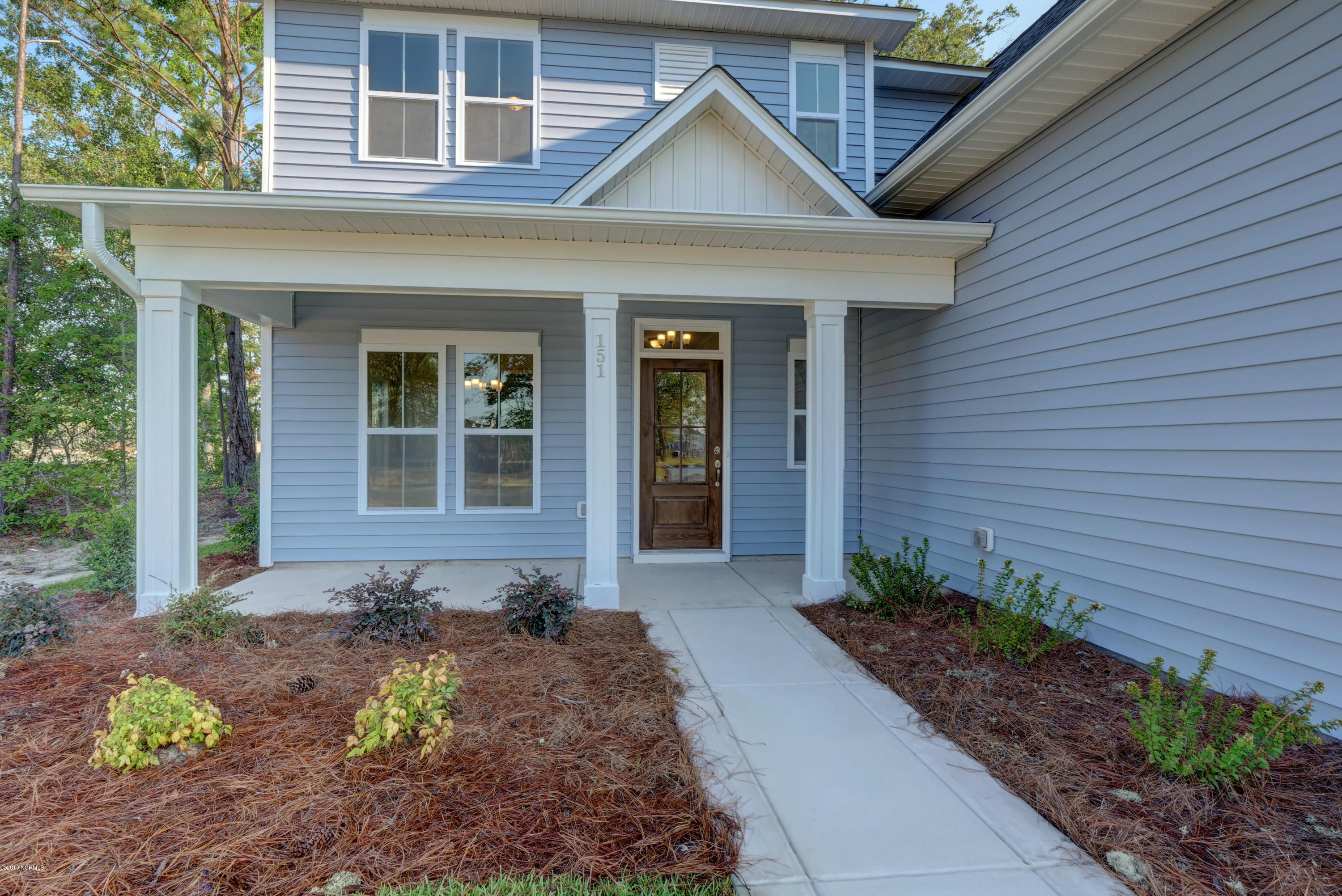 151 Violetear Ridge, Unit LOT #36 Hampstead, NC 28443 - Photo 2 of 27 P1488165_66_67_68_69_70_71