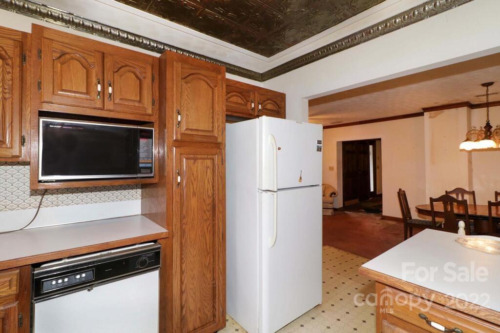555 Bradshaw Road Salisbury, NC 28147 - Photo 13 of 48 a kitchen with stainless steel appliances a refrigerator and a stove top oven
