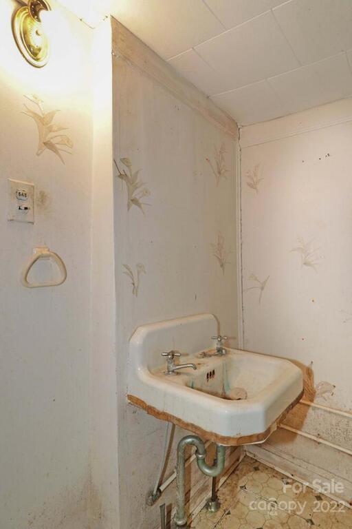 555 Bradshaw Road Salisbury, NC 28147 - Photo 21 of 48 a bathroom with a sink and shower