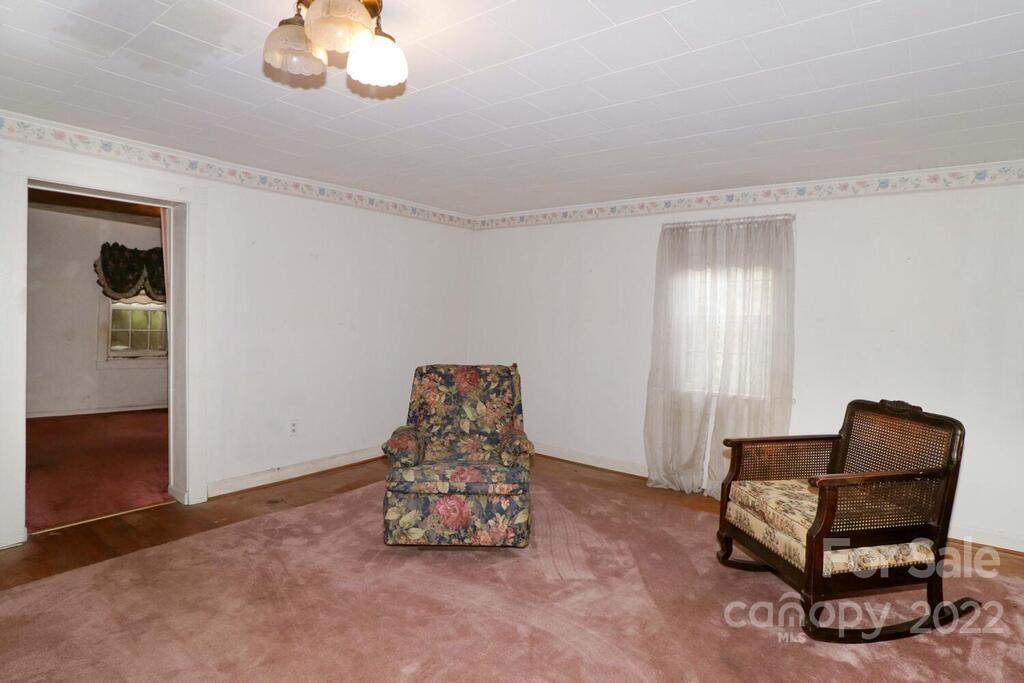 555 Bradshaw Road Salisbury, NC 28147 - Photo 26 of 48 a living room with furniture and a window