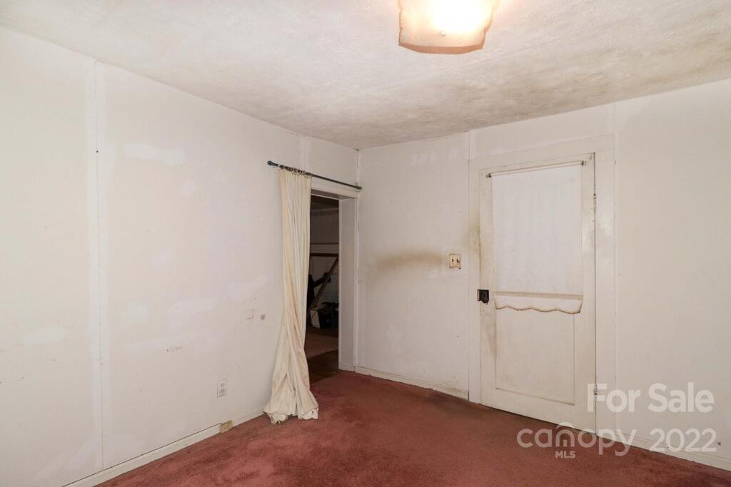 555 Bradshaw Road Salisbury, NC 28147 - Photo 28 of 48 an empty room with an entryway
