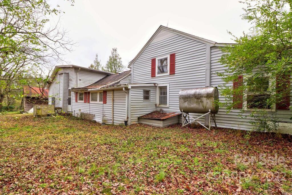 555 Bradshaw Road Salisbury, NC 28147 - Photo 35 of 48 a view of a house with a yard and sitting area