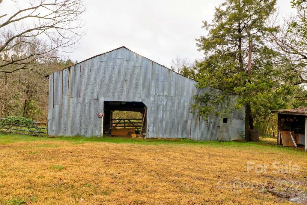 555 Bradshaw Road Salisbury, NC 28147 - Photo 37 of 48 a front view of a house with a yard and garage