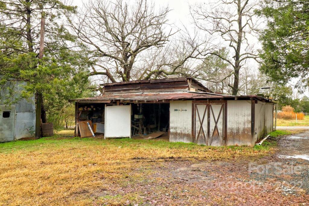 555 Bradshaw Road Salisbury, NC 28147 - Photo 39 of 48 a house that has a tree in front of it